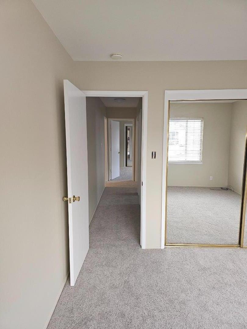 160 Clarendon Road, Unit A Pacifica, CA 94044 - Photo 5 of 7 an empty room with windows