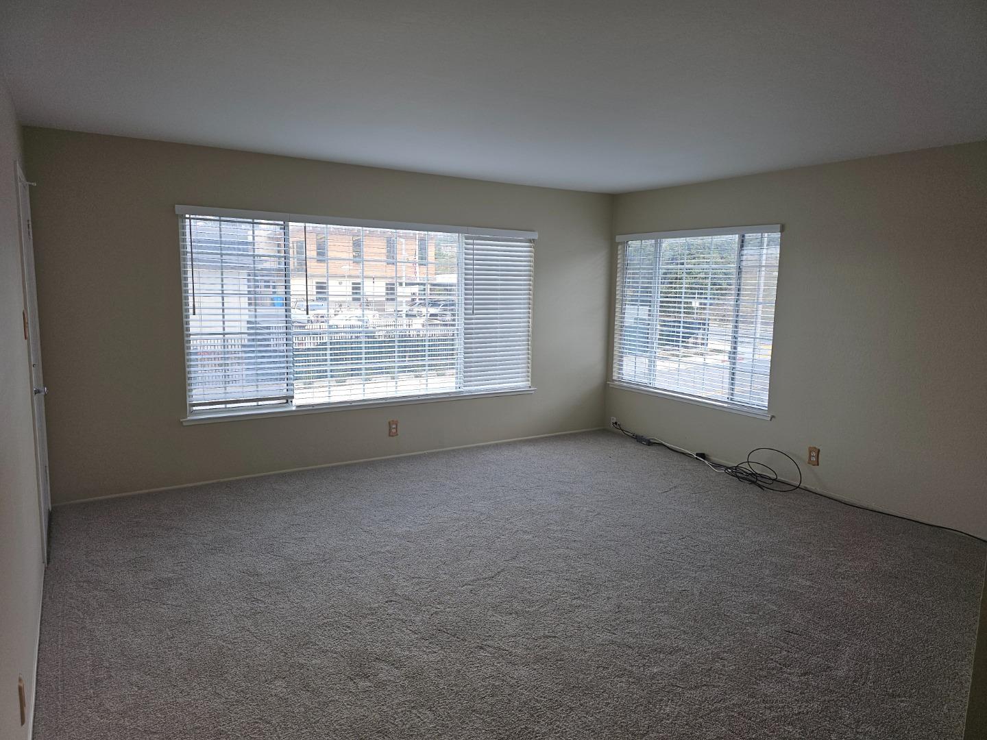 160 Clarendon Road, Unit A Pacifica, CA 94044 - Photo 7 of 7 an empty room with a window