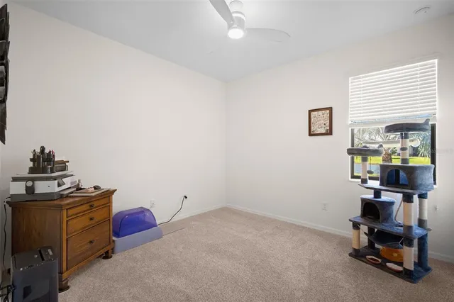 a room with furniture and a window