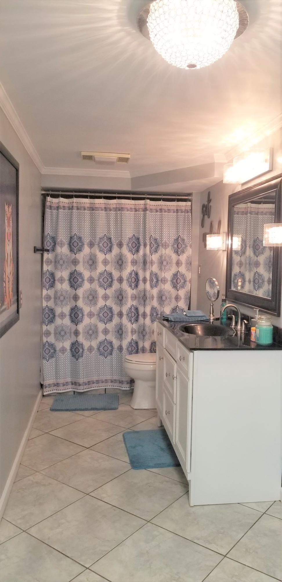 1317 Chandler Road Goodview, VA 24095 - Photo 21 of 29 a large white kitchen with granite countertop a sink