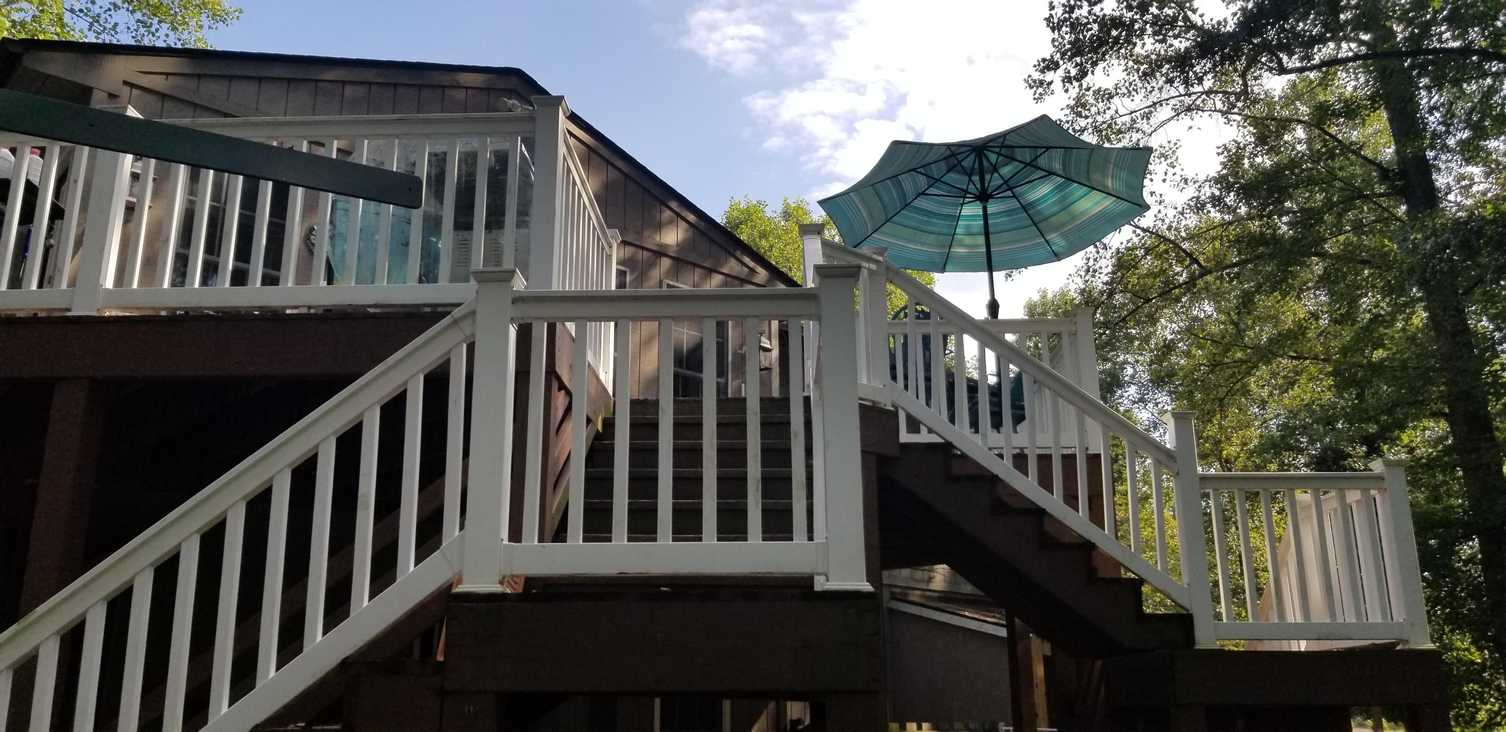 1317 Chandler Road Goodview, VA 24095 - Photo 29 of 29 a view of balcony with wooden floor and stairs
