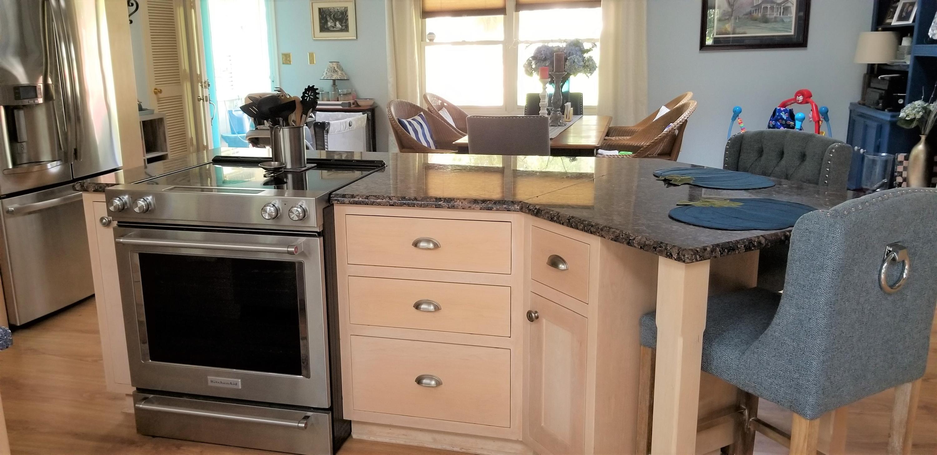 1317 Chandler Road Goodview, VA 24095 - Photo 4 of 29 a kitchen with kitchen island granite countertop a stove and a sink