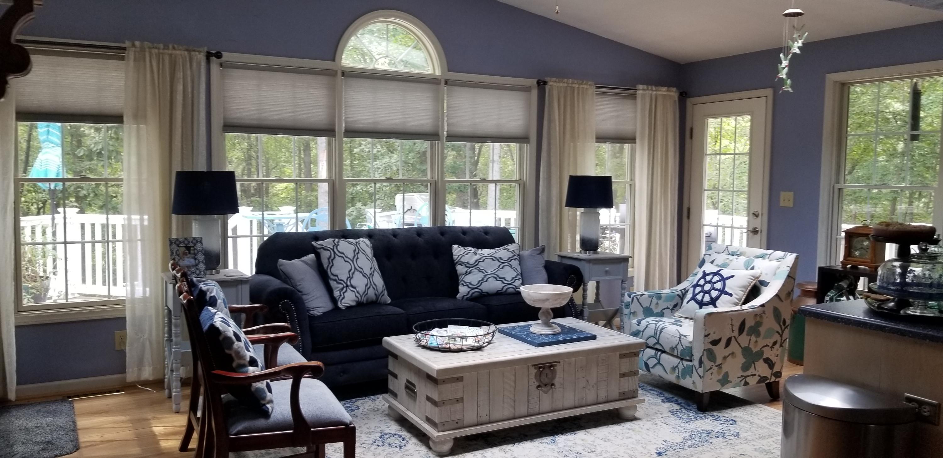 1317 Chandler Road Goodview, VA 24095 - Photo 6 of 29 a living room with furniture and a large window
