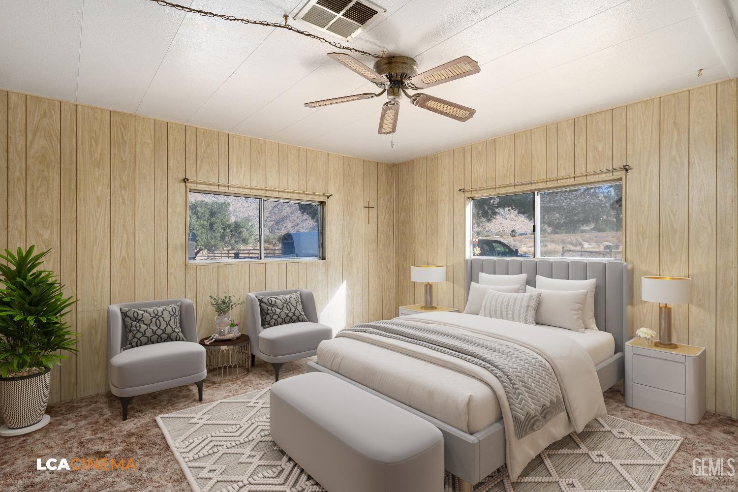 Undisclosed Address Onyx, CA 93255 - Photo 12 of 33 a bedroom with a large bed and a couch