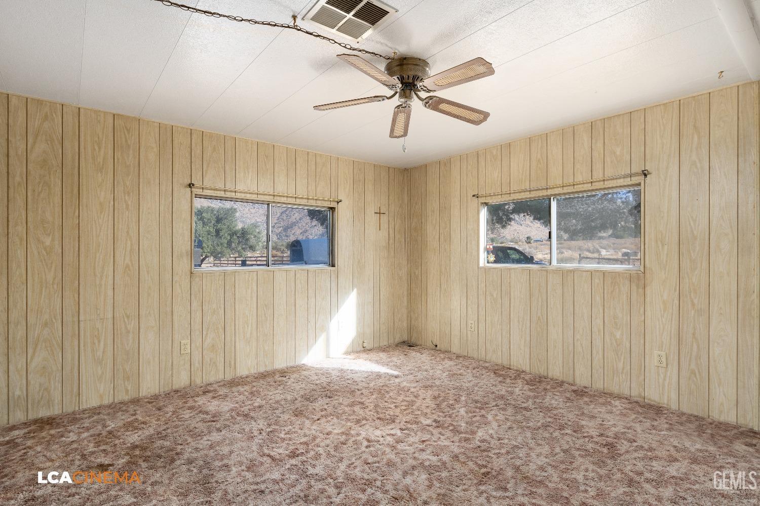 Undisclosed Address Onyx, CA 93255 - Photo 13 of 33 a view of an empty room with a window