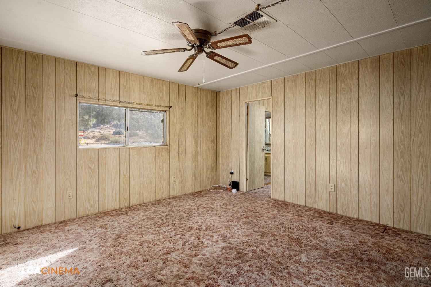 Undisclosed Address Onyx, CA 93255 - Photo 15 of 33 a view of an empty room with a window