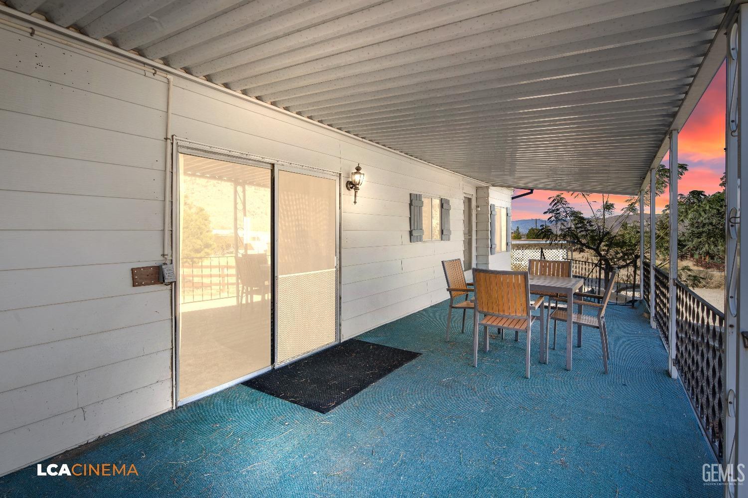 Undisclosed Address Onyx, CA 93255 - Photo 20 of 33 a view of a porch with furniture and yard