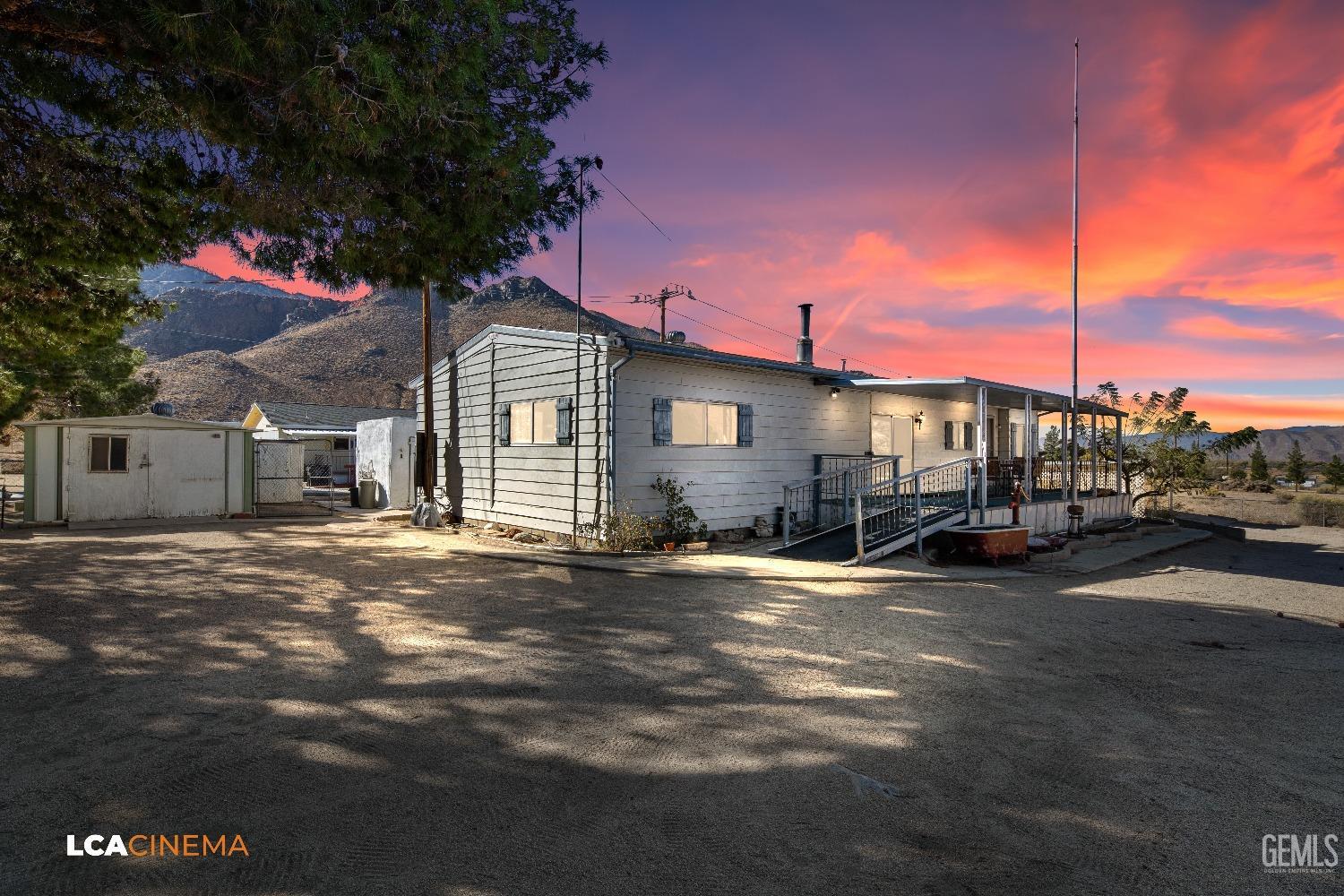 Undisclosed Address Onyx, CA 93255 - Photo 2 of 33 a view of a house with a patio