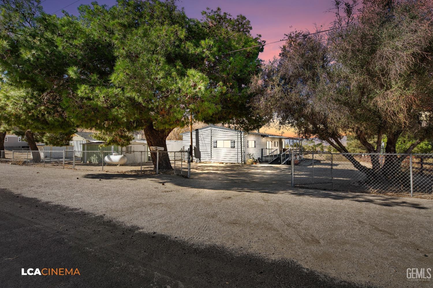 Undisclosed Address Onyx, CA 93255 - Photo 24 of 33 a view of street with large trees