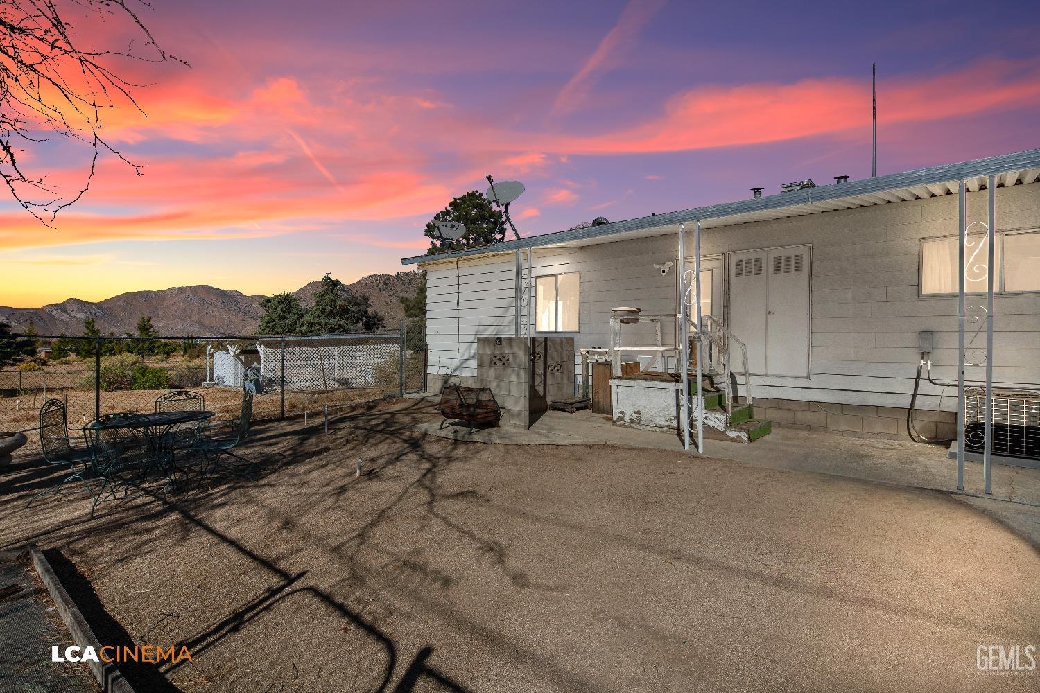 Undisclosed Address Onyx, CA 93255 - Photo 3 of 33 a view of a house with a patio