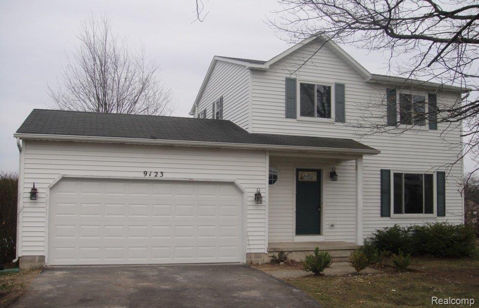9123 Kestrel Ridge Road Brighton, MI 48116 - Photo 1 of 9 Front Elevation
