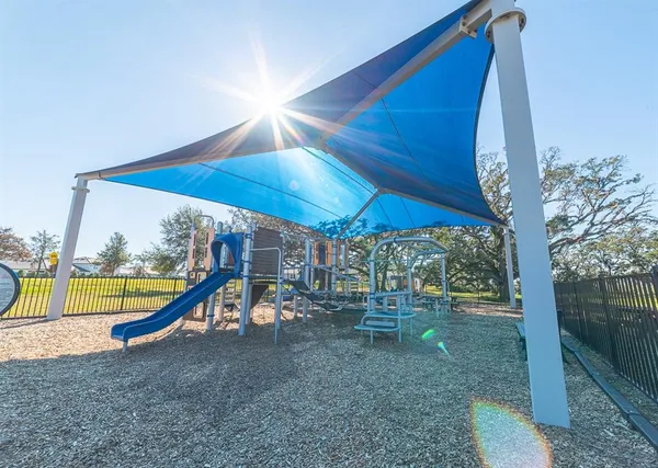 a view of a park with slide