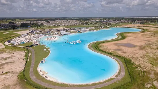 a view of a swimming pool with a lake