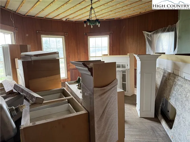 a view of a livingroom with furniture and a window