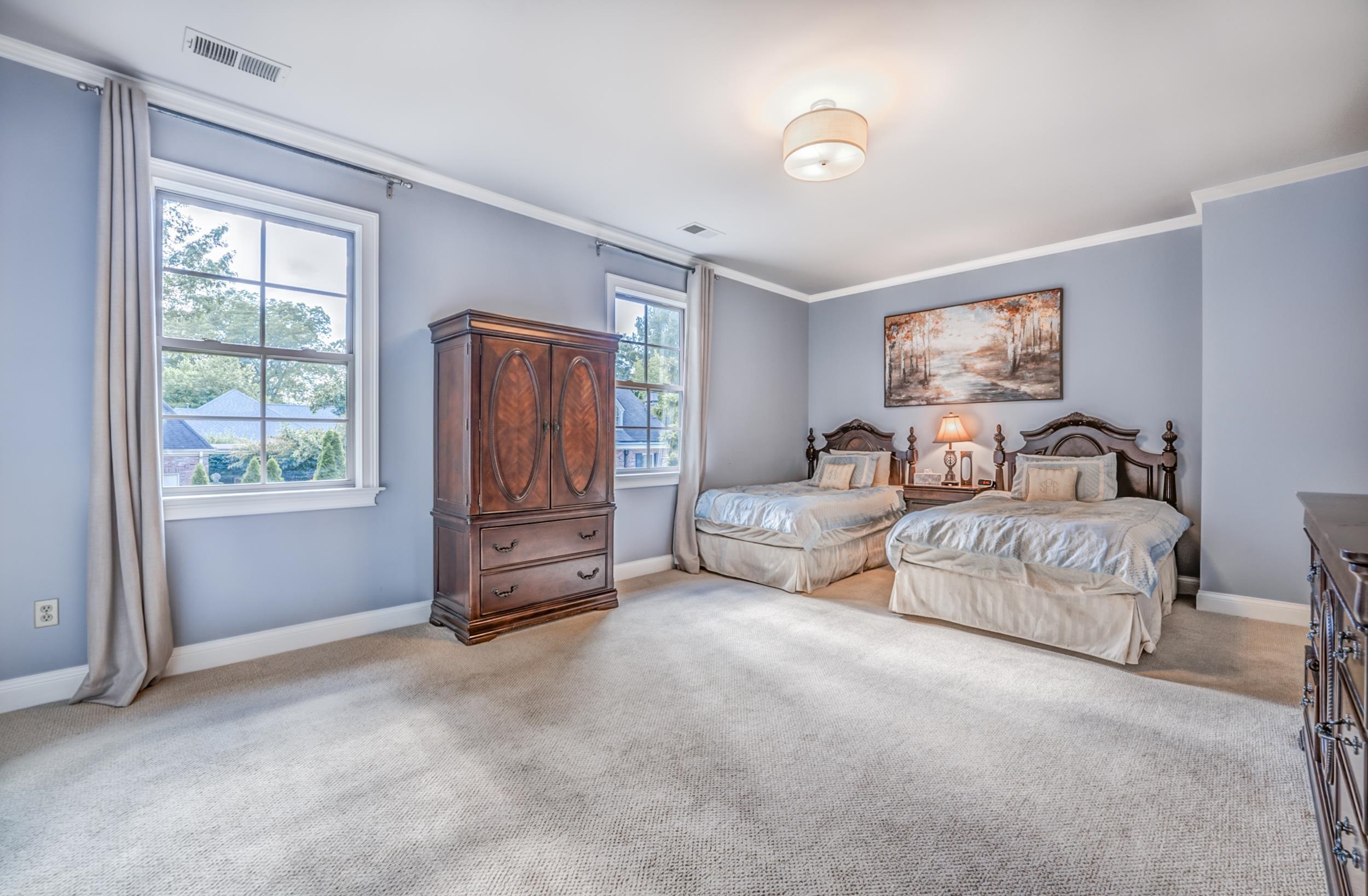 477 South Yates Road Memphis, TN 38120 - Photo 32 of 39 a bedroom with furniture and a window