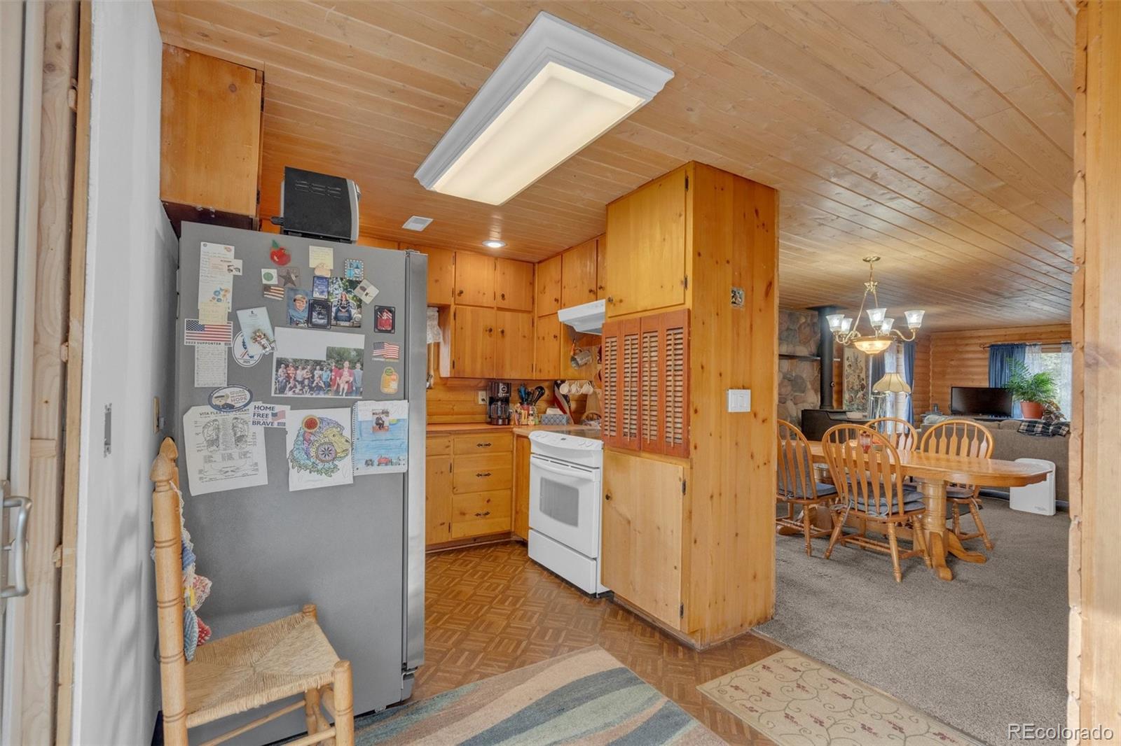 847 Timber Ridge Road Divide, CO 80814 - Photo 13 of 41 a view of kitchen with furniture and refrigerator