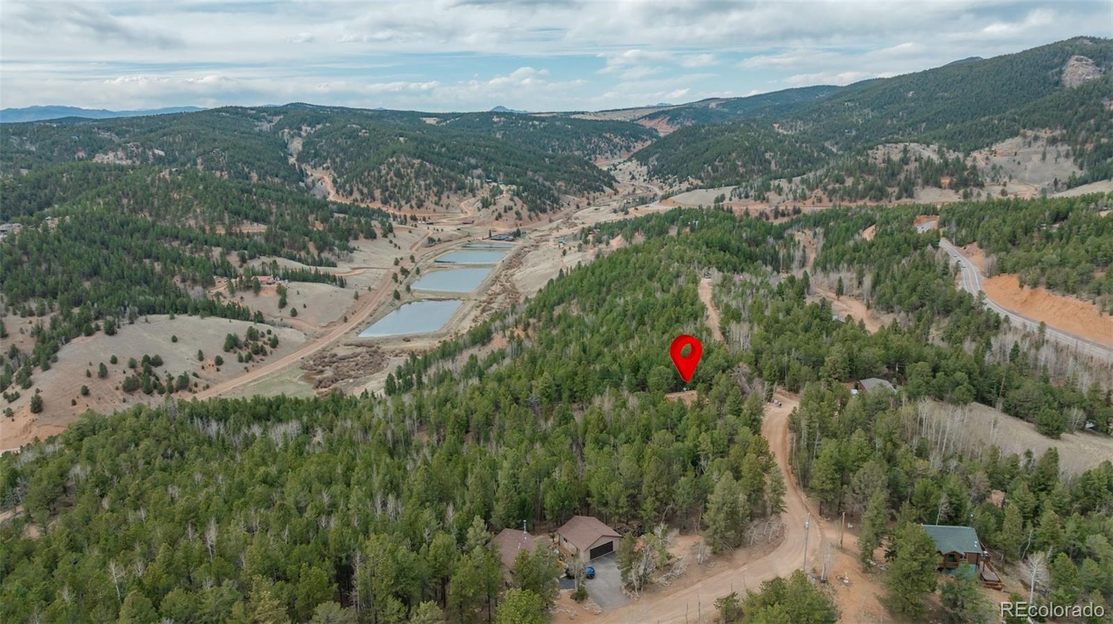 847 Timber Ridge Road Divide, CO 80814 - Photo 39 of 41 an aerial view of a town with couple of houses
