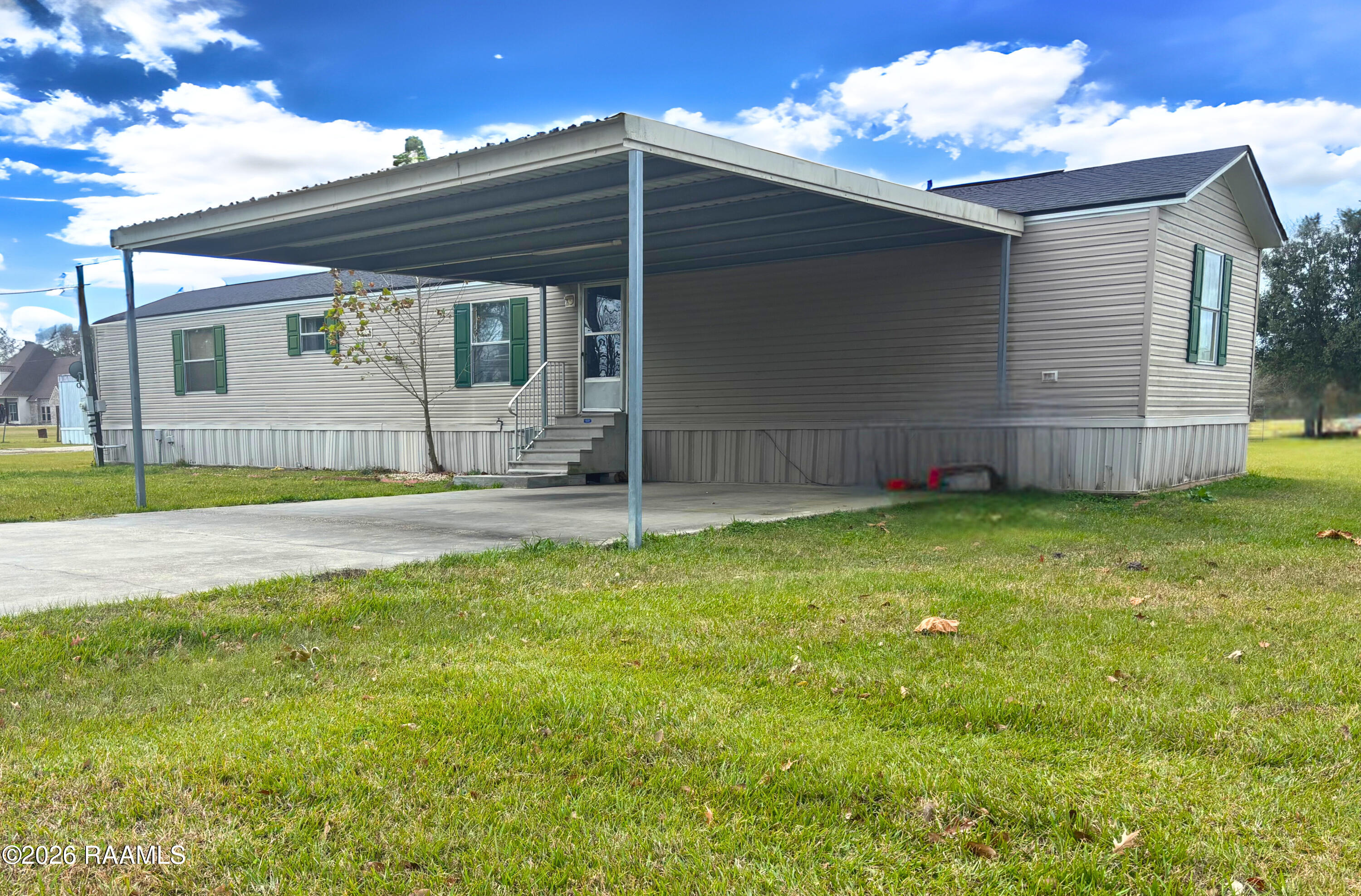 104 Gourmet Road Carencro, LA 70520 - Photo 2 of 13 Front view - Edited