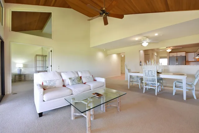 a bed room with a bed and a night stand