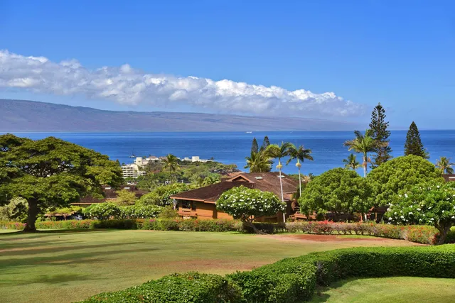 a bathroom with a double vanity sink and mirror