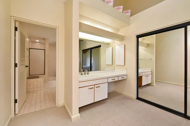 a bathroom with a bathtub and a sink
