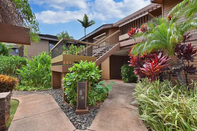 a view of a swimming pool with a table and chairs