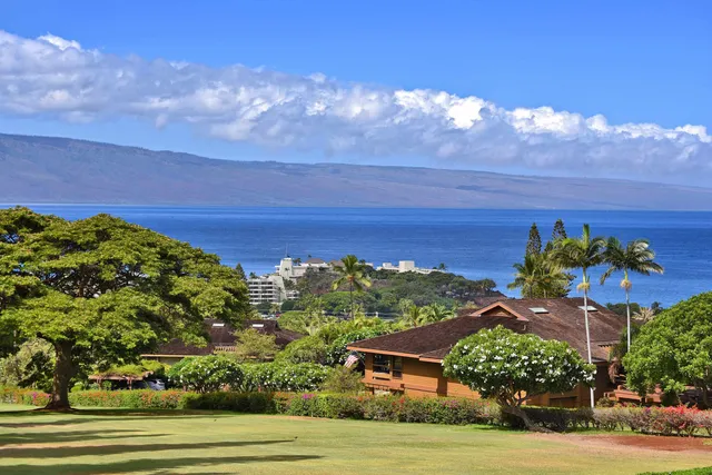 a view of a balcony with chairs