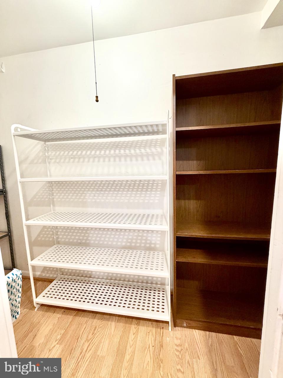4630 28th Road South, Unit C Arlington, VA 22206 - Photo 25 of 40 Lower-Level Finished Storage Area (Shelves Convey)
