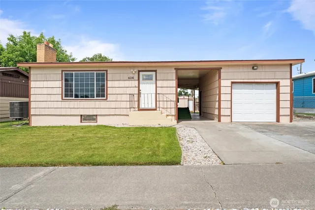 front view of a house and a yard