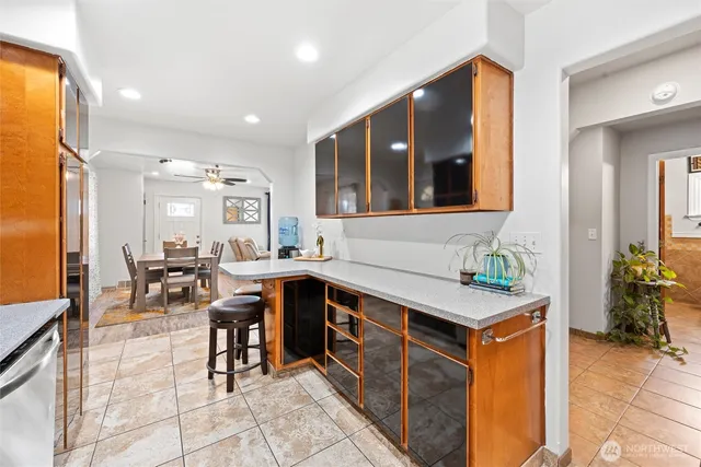 a view of kitchen with breakfast area