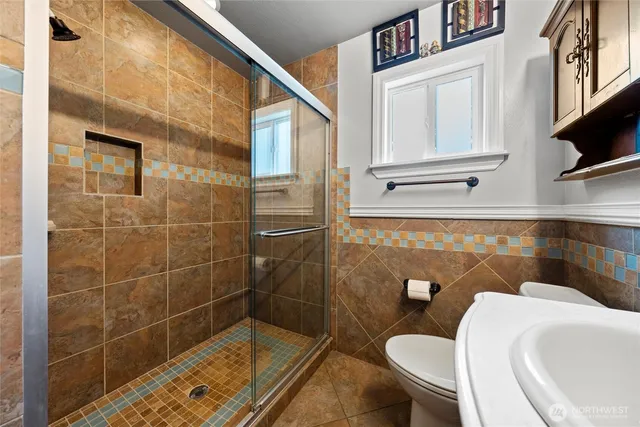 a bathroom with a sink and toilet