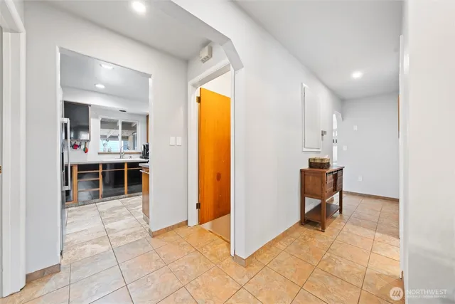 a view of a bathroom with sink and mirror