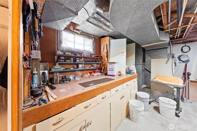 a kitchen with stainless steel appliances a sink a stove and a microwave