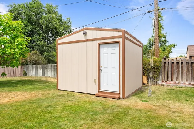 a backyard of a house with lots of green space