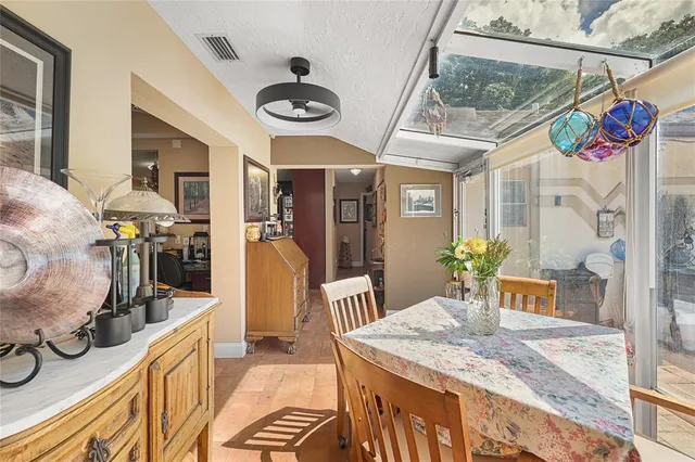 a kitchen with stainless steel appliances granite countertop a refrigerator stove and oven