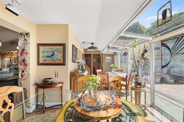 a dinning area with lots of furniture and lots of furniture