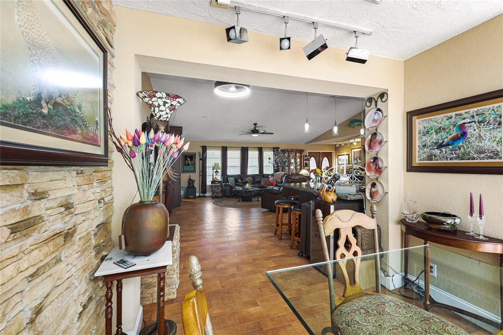 9700 Northwest 28th Street Hollywood, FL 33024 - Photo 24 of 76 a living room with furniture and a potted plant