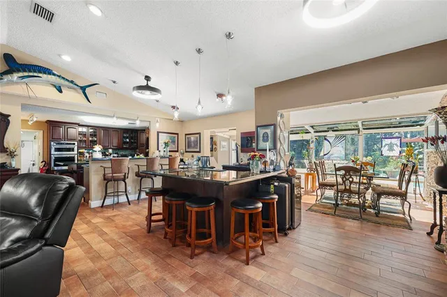 a view of a swimming pool with sitting area