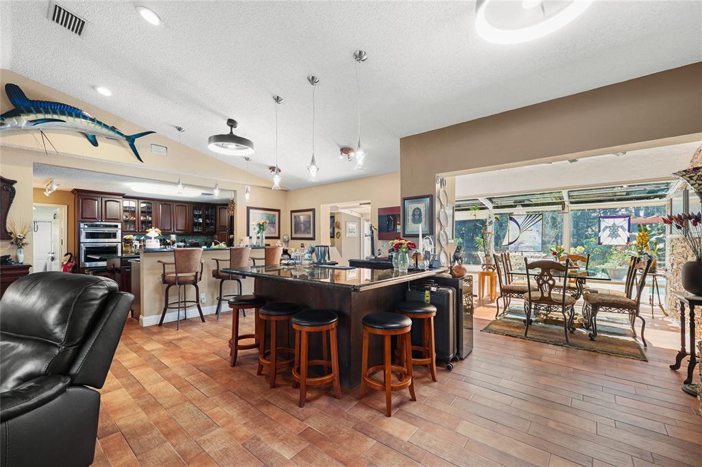 9700 Northwest 28th Street Hollywood, FL 33024 - Photo 28 of 76 a dinning area with lots of furniture and lots of furniture