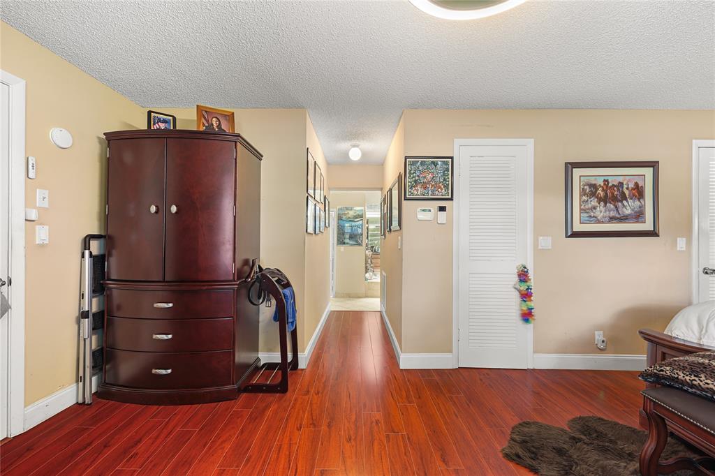 9700 Northwest 28th Street Hollywood, FL 33024 - Photo 33 of 76 a view of a livingroom with wooden floor and furniture