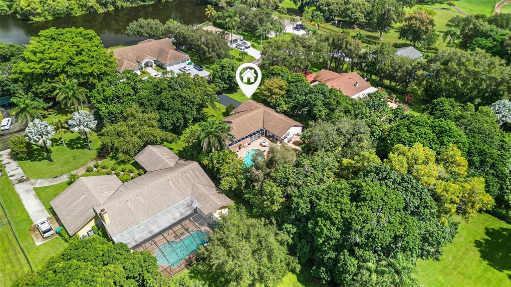 9700 Northwest 28th Street Hollywood, FL 33024 - Photo 4 of 76 an aerial view of a house with yard