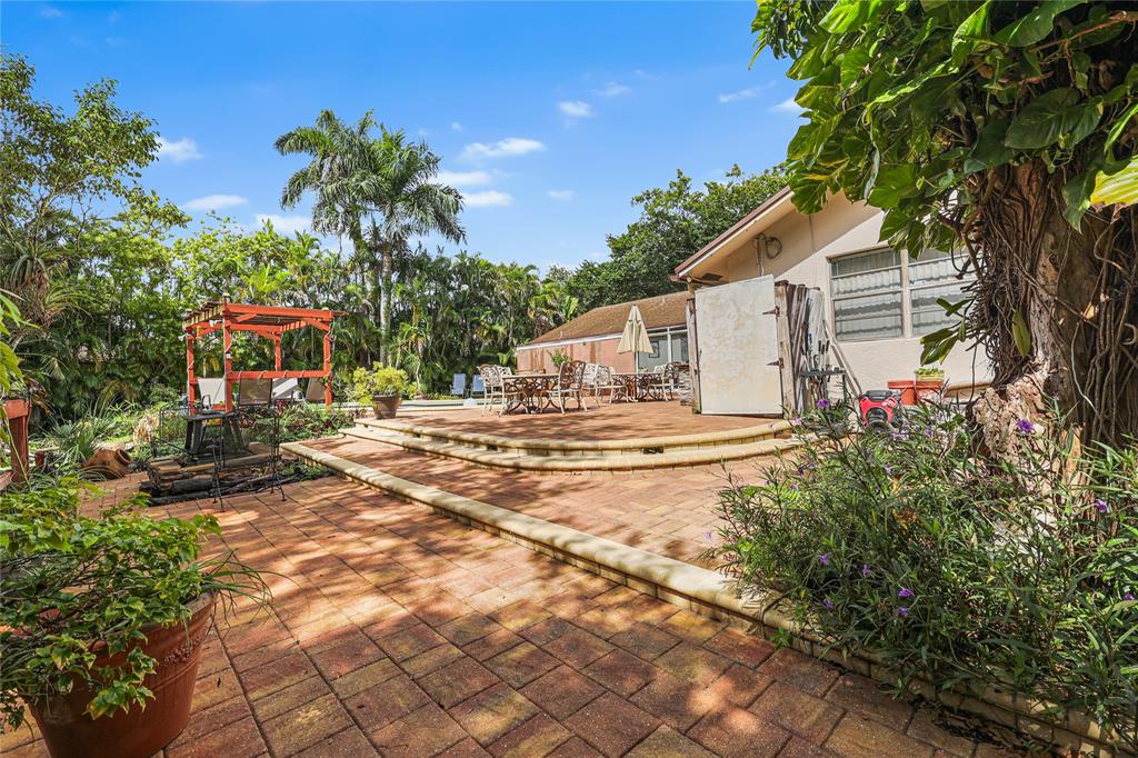 9700 Northwest 28th Street Hollywood, FL 33024 - Photo 45 of 76 a view of outdoor space and yard