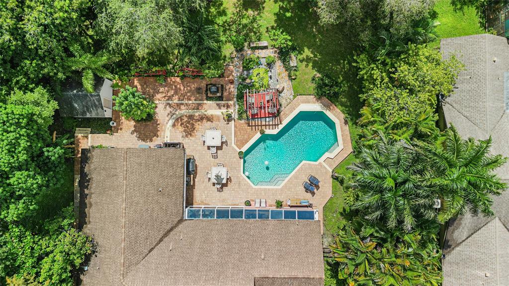 9700 Northwest 28th Street Hollywood, FL 33024 - Photo 67 of 76 an aerial view of a house with a swimming pool