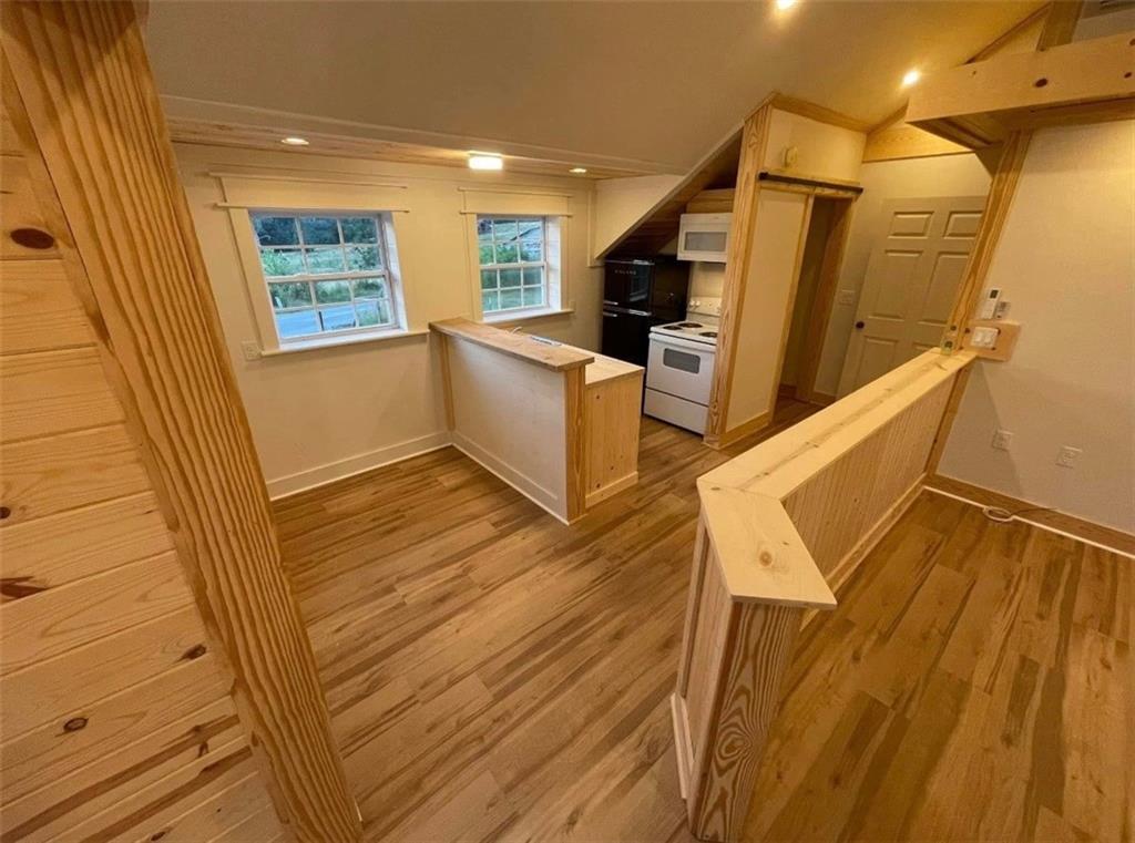 4729 Willie Robinson Road Gainesville, GA 30506 - Photo 7 of 18 a view of a kitchen with furniture and a window