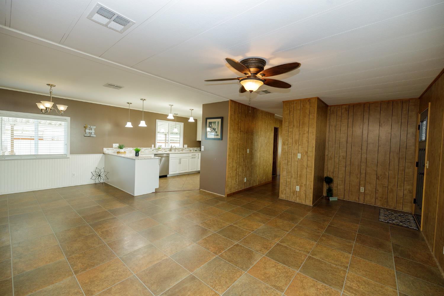 3418 North Waring Road, Unit 24 Denair, CA 95316 - Photo 11 of 48 a view of an empty room with a window