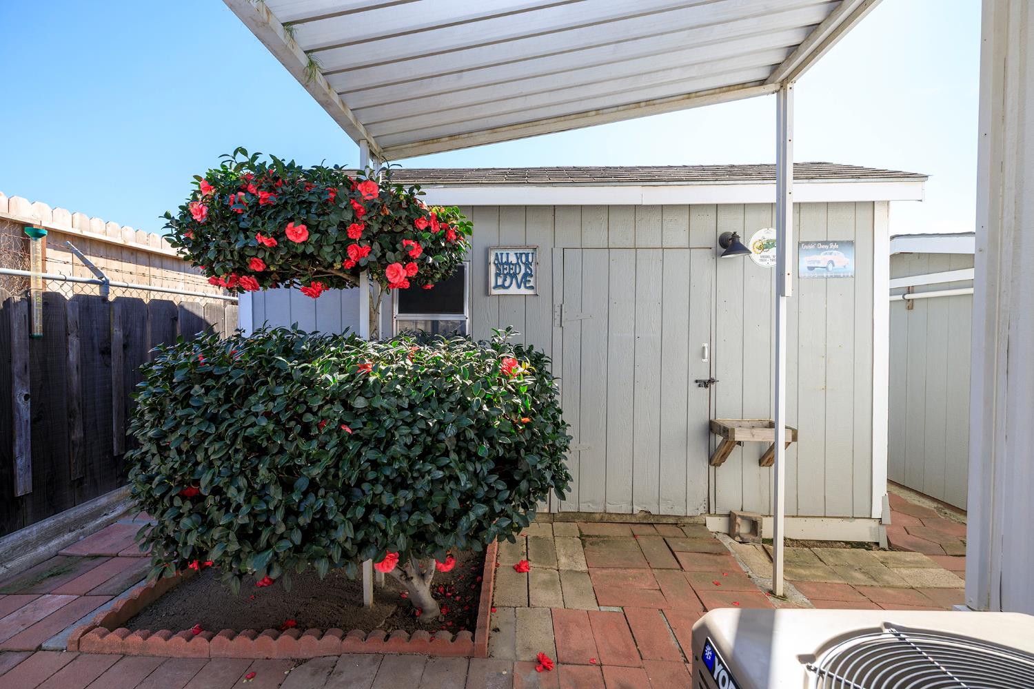 3418 North Waring Road, Unit 24 Denair, CA 95316 - Photo 31 of 48 a outdoor space with flowers