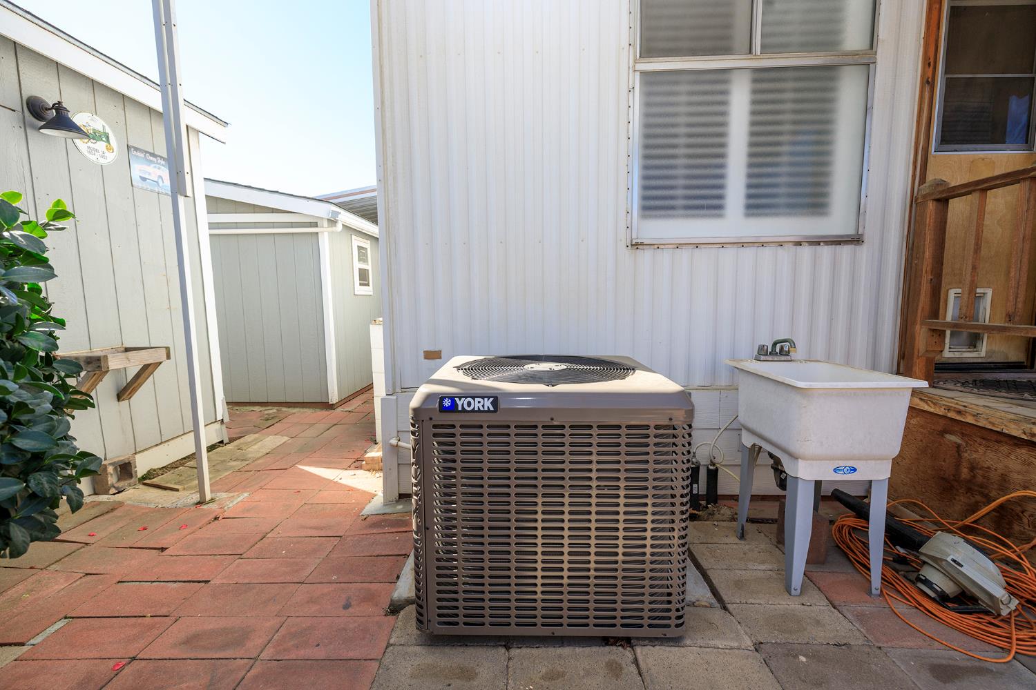3418 North Waring Road, Unit 24 Denair, CA 95316 - Photo 36 of 48 a view of a patio with table and chairs