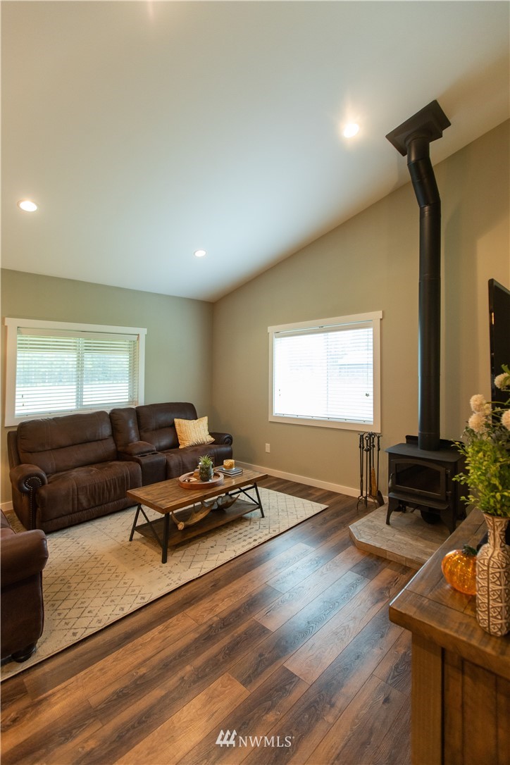 800 Logan Hill Road Chehalis, WA 98532 - Photo 14 of 36 a living room with furniture and a window
