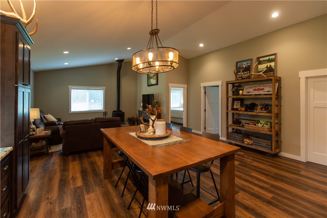 800 Logan Hill Road Chehalis, WA 98532 - Photo 20 of 36 a view of a dining room with furniture and wooden floor