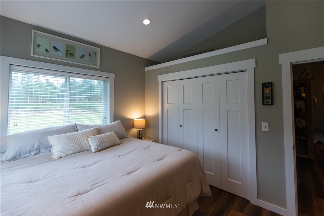 800 Logan Hill Road Chehalis, WA 98532 - Photo 22 of 36 a bedroom with a bed and a window